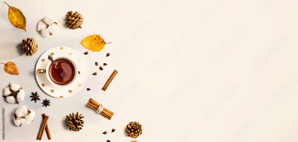 Autumn theme with cinnamon tea - flat lay