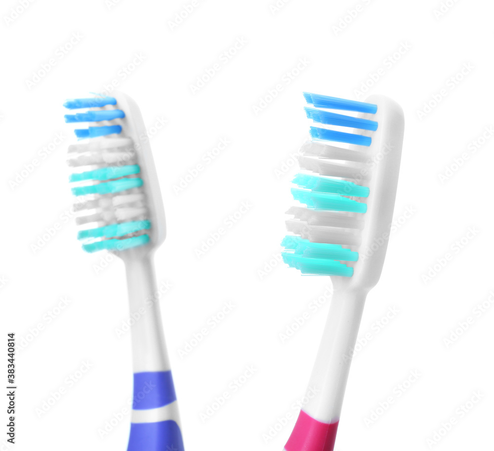 Tooth brushes on white background