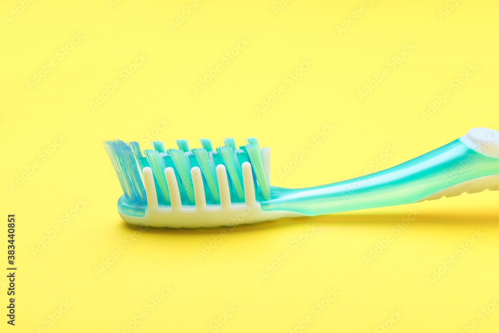 Tooth brush on color background