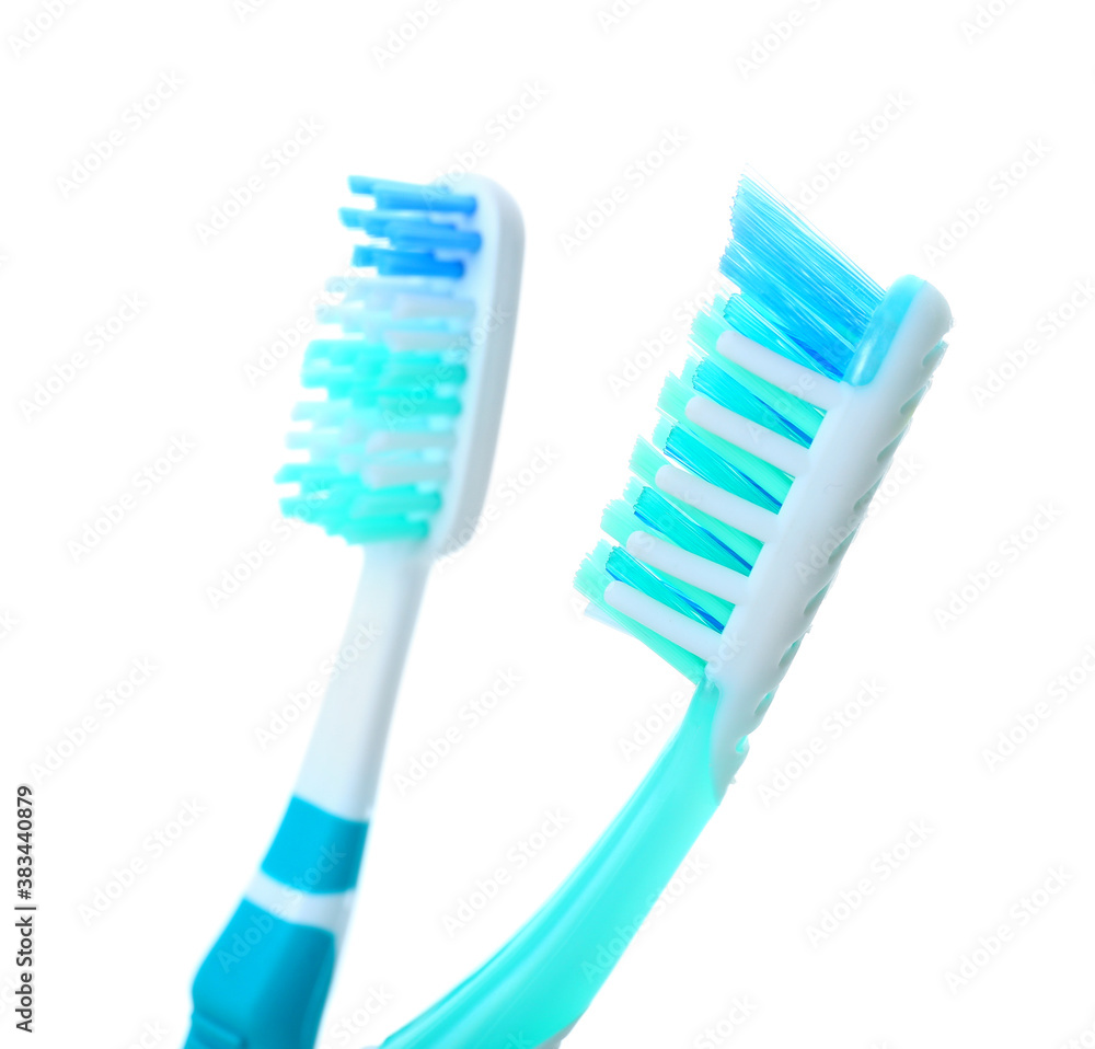 Tooth brushes on white background