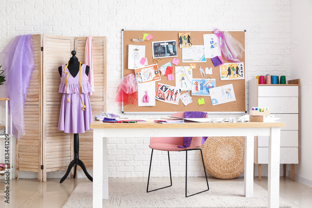 Workplace in studio of fashion designer