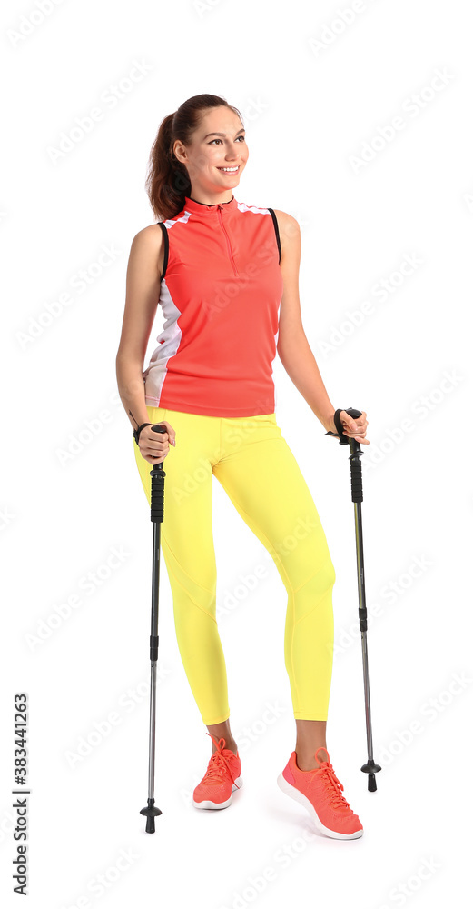 Young woman with walking poles on white background