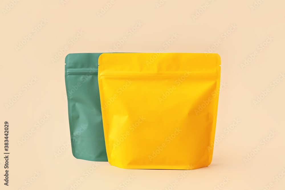 Blank bags on color background