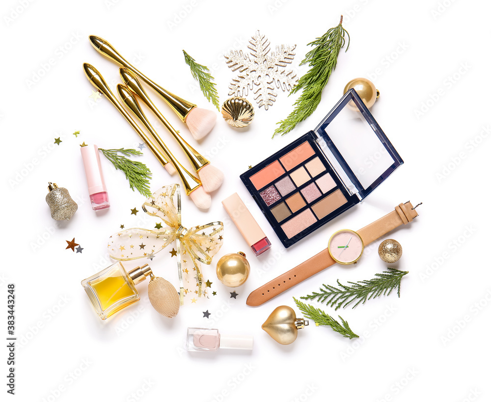 Christmas composition with cosmetics on white background