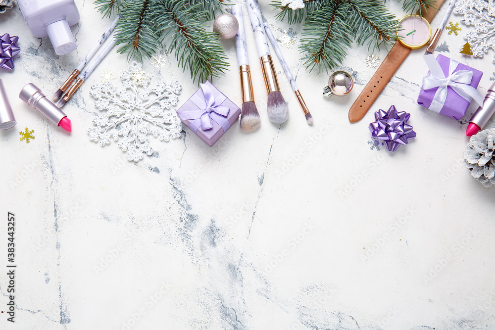 Christmas composition with cosmetics on light background