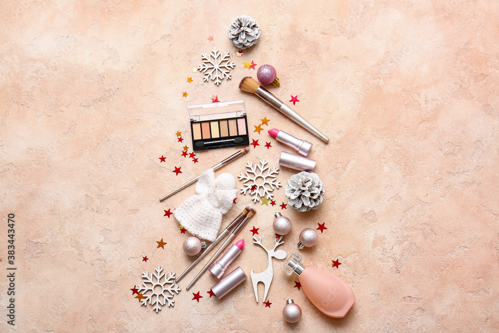 Christmas composition with cosmetics on color background