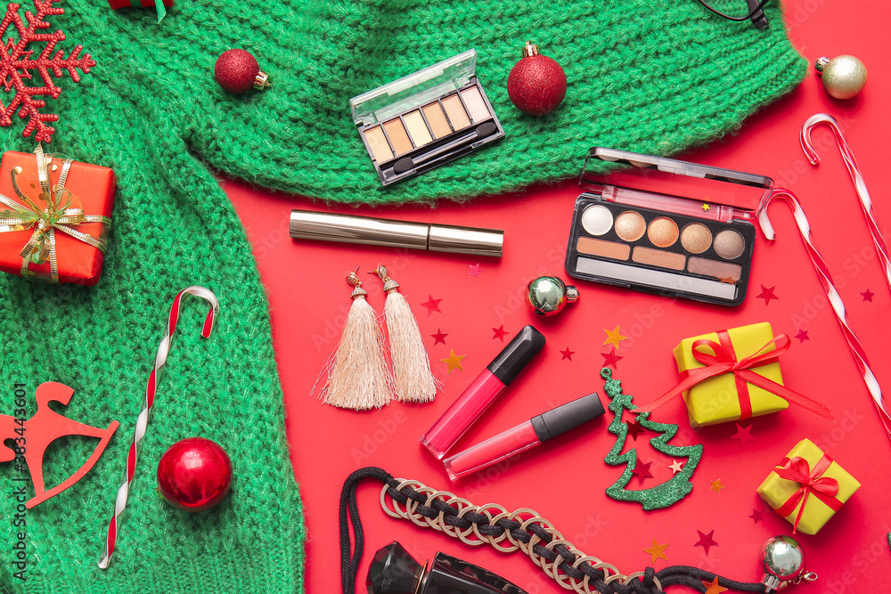 Christmas composition with cosmetics on color background