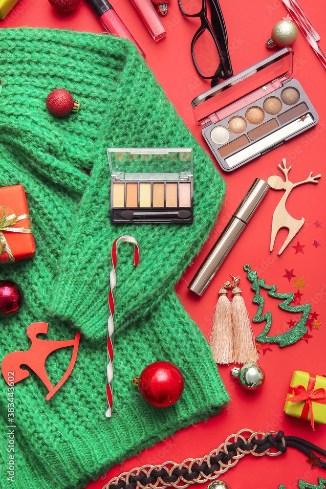 Christmas composition with cosmetics on color background