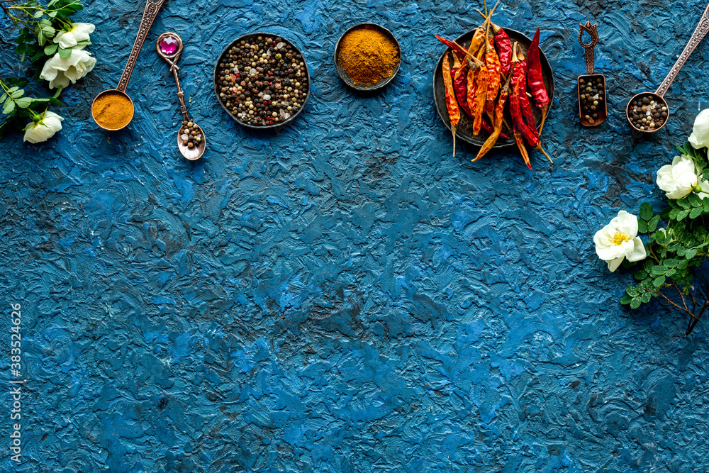 Overhead view of hot spice. Red pepper and paprika with cooking utensils