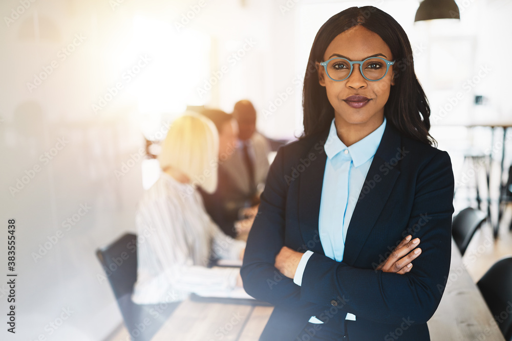 African businesswoman standing in a boardroom