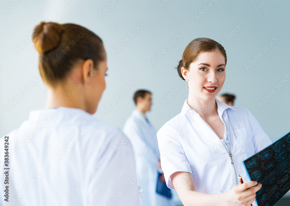 Doctor talking with a colleague