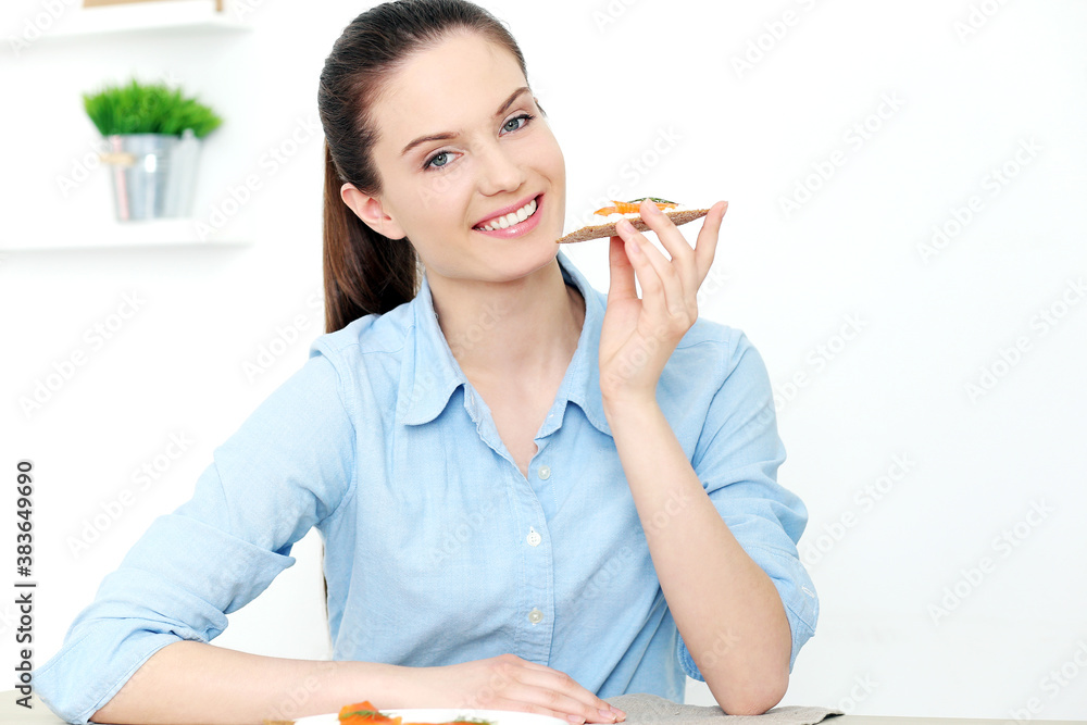 Breakfast. Cute girl at the table