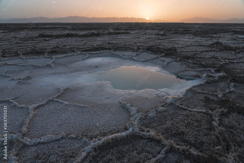 Salt pond in the dry land in Qinghai, China.