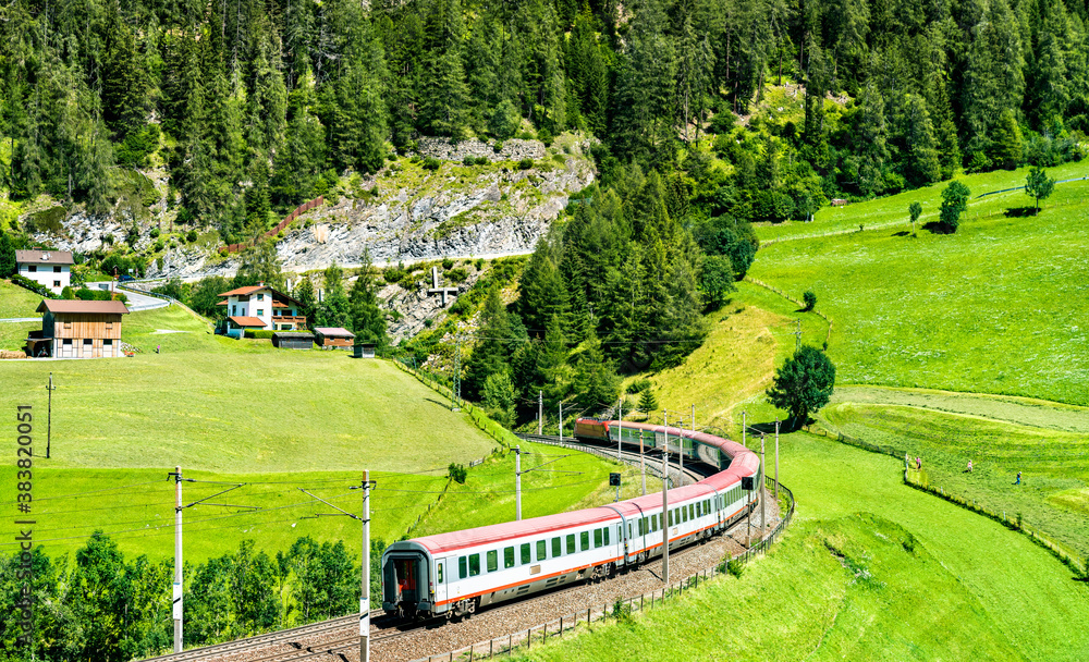 Passenger train at the Brenner Railway in the Austrian Alps