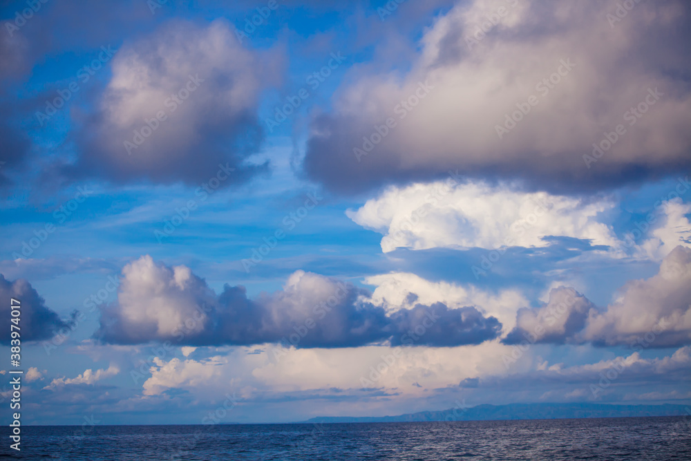 Blue sky with a heap, white clouds