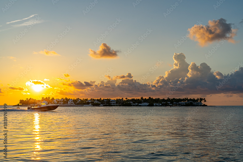 Sunset, view of Sunset y Island from Mallory Square, Key West, Florida, US