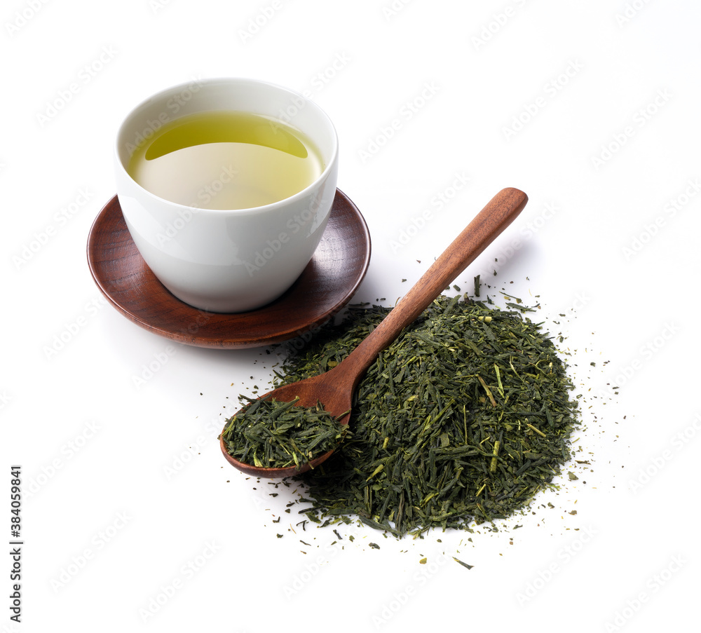 Green tea and tea leaves on a white background