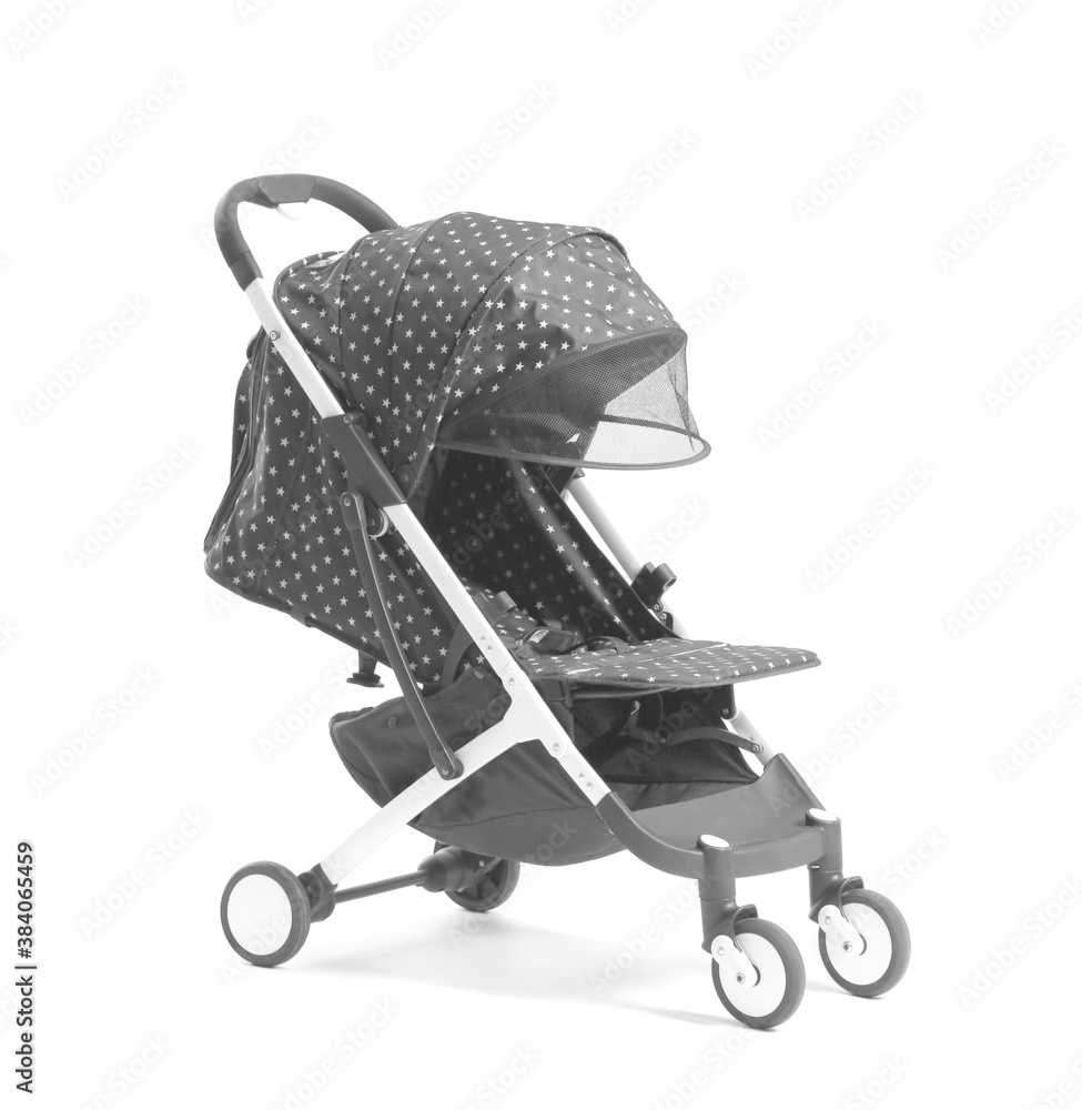 Modern baby stroller on light background