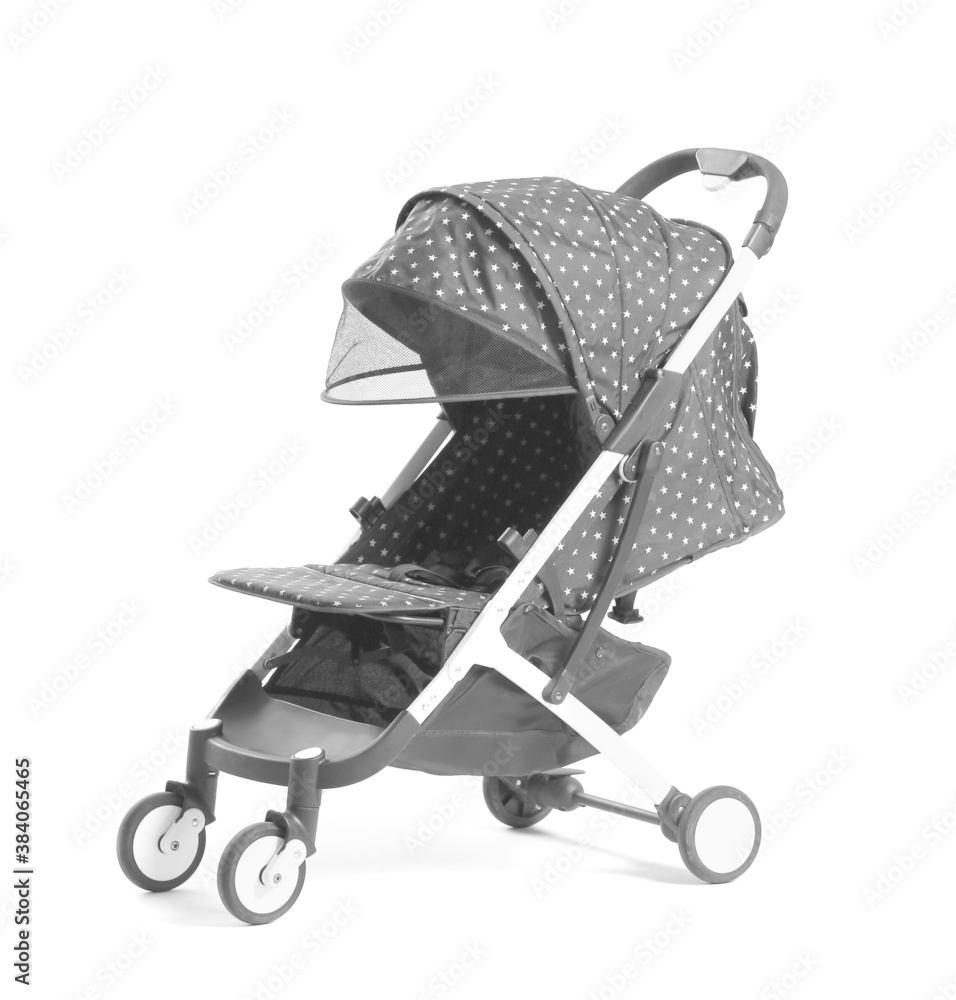 Modern baby stroller on light background