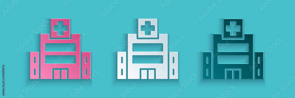 Paper cut Medical hospital building with cross icon isolated on blue background. Medical center. Hea