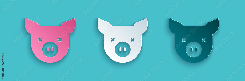 Paper cut Pig icon isolated on blue background. Animal symbol. Paper art style. Vector.