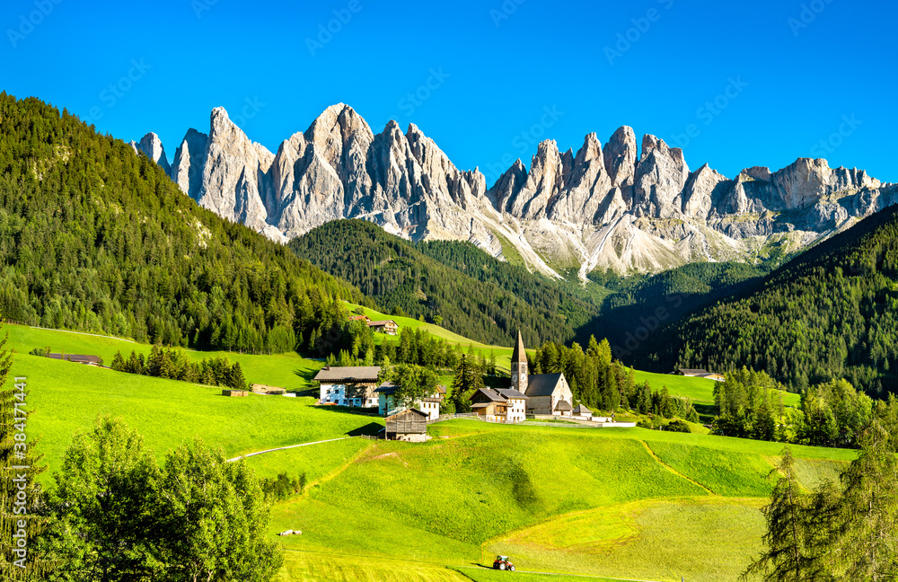 View of Val di Funes with the Chruch of Santa Maddalena in the Dolomites Mountains. UNESCO world her