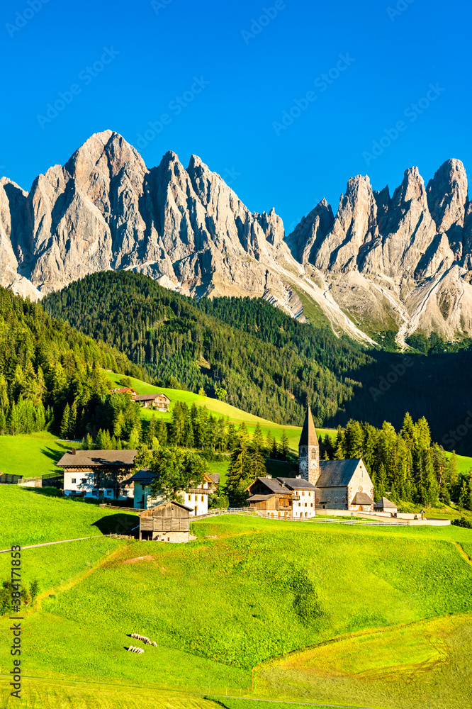 View of Val di Funes with the Chruch of Santa Maddalena in the Dolomites Mountains. UNESCO world her