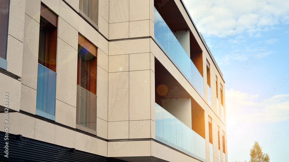 Apartment residential house and home facade architecture and outdoor facilities. Blue sky on the bac