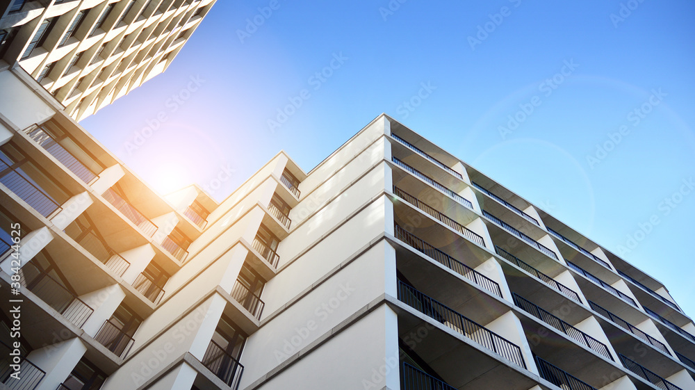 Apartment residential house and home facade architecture and outdoor facilities. Blue sky on the bac