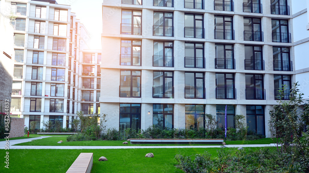 Apartment residential house and home facade architecture and outdoor facilities. Blue sky on the bac