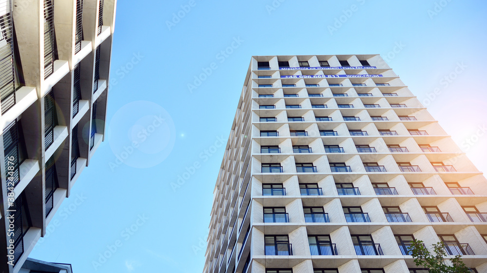 Apartment residential house and home facade architecture and outdoor facilities. Blue sky on the bac