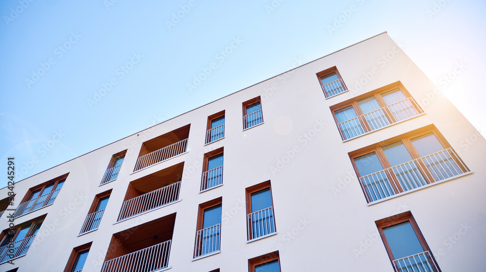 Apartment residential house and home facade architecture and outdoor facilities. Blue sky on the bac