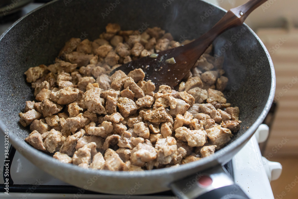 chopped pork roast on a pan