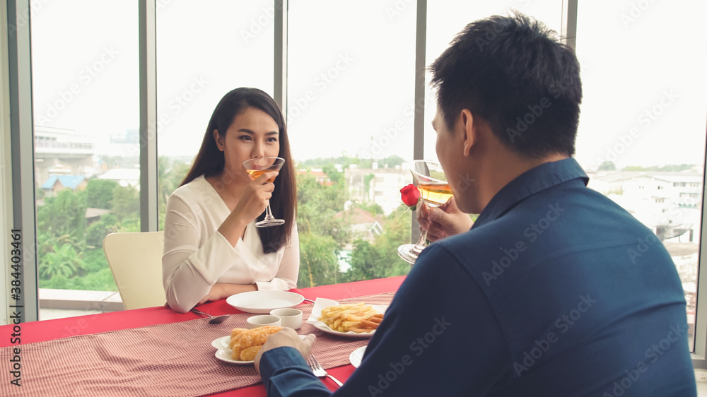 Happy romantic couple eating lunch at restaurant . Couple anniversary celebration and lifestyle .