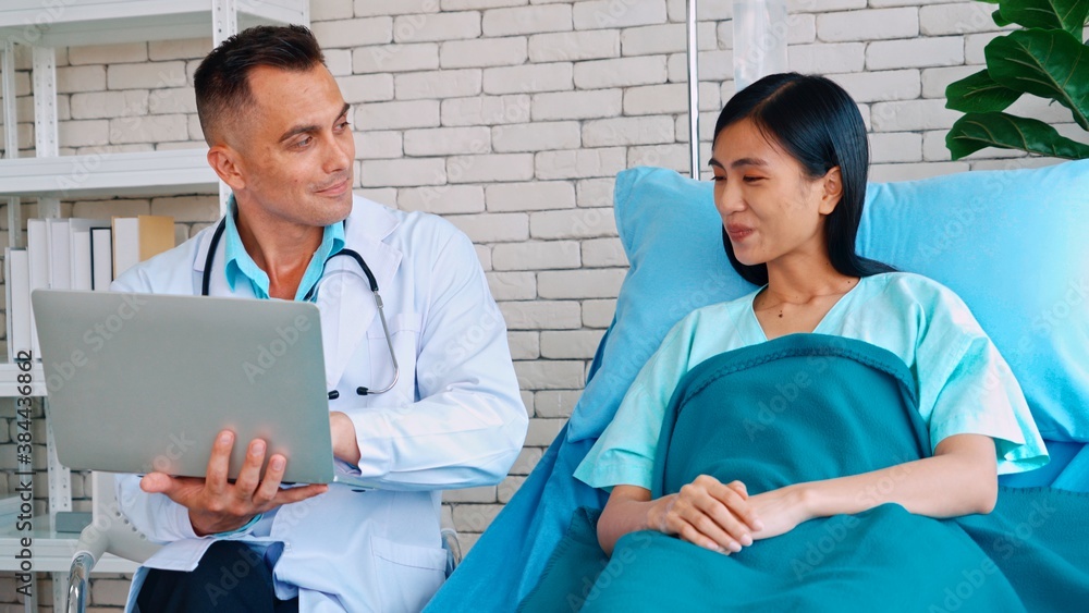 Doctor in professional uniform examining patient at hospital or medical clinic. Health care , medica