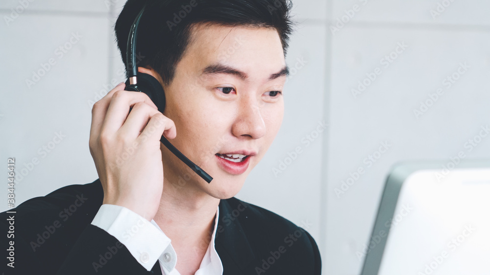 Business people wearing headset working in office to support remote customer or colleague. Call cent