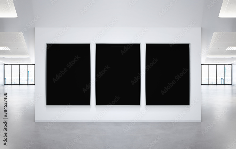 Three vertical frames Mockup hanging on office wall. Mock up of a billboards in modern company inter