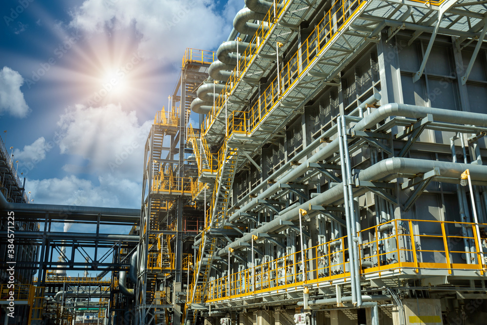 Close up Industrial view at oil and gas refinery plant form industry zone with sunrise and cloudy sk