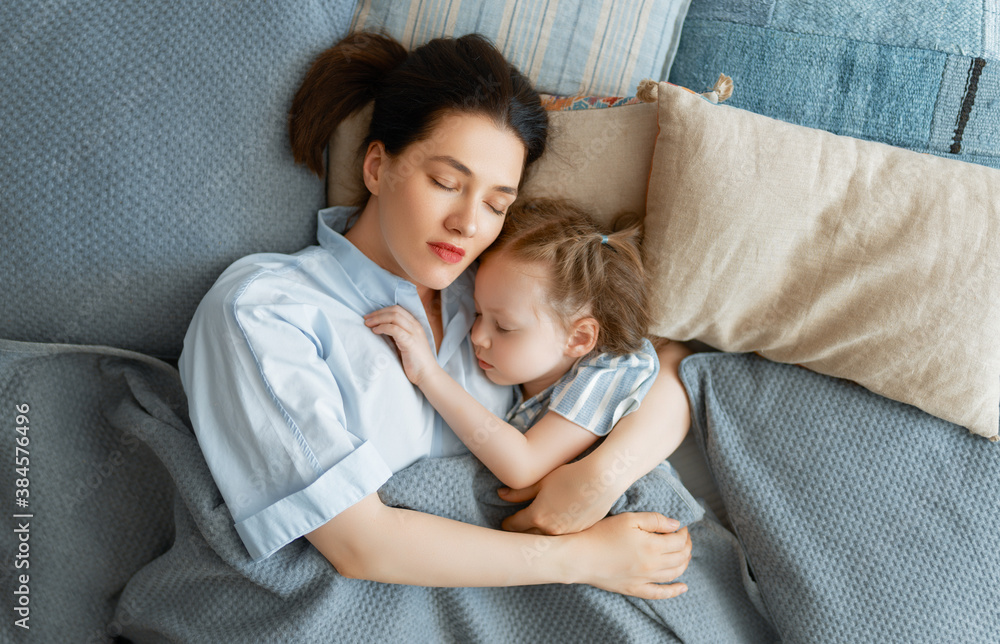 girl and mother enjoy sunny morning