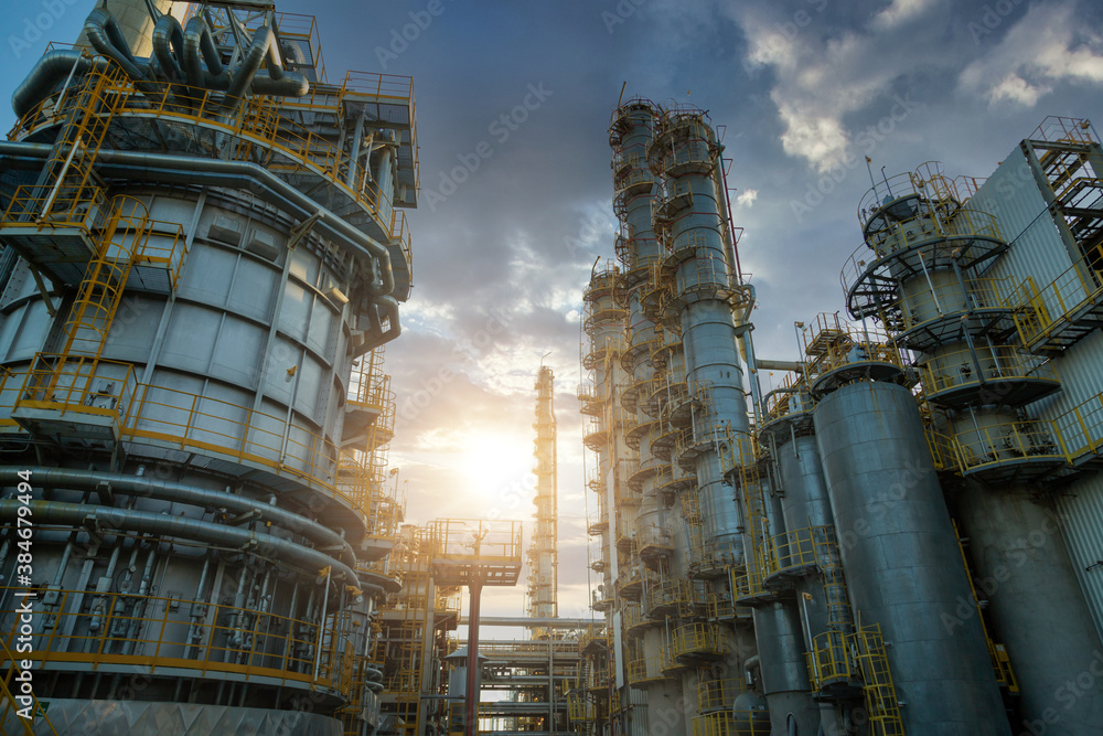 Close up Industrial view at oil and gas refinery plant form industry zone with sunrise and cloudy sk