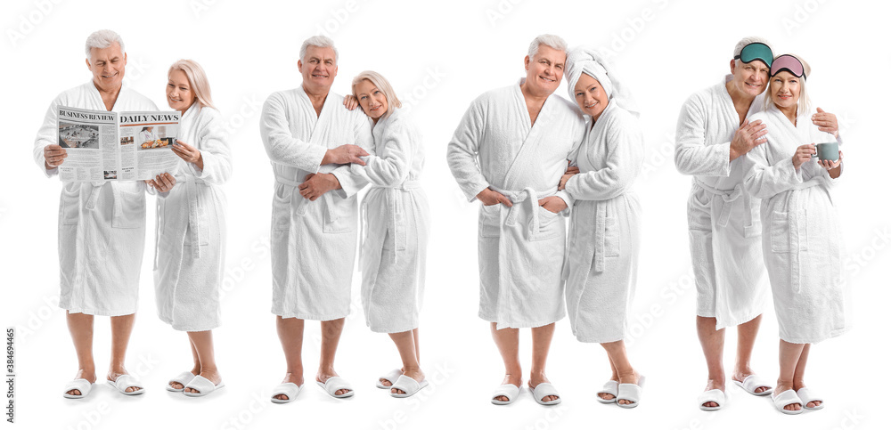 Mature couple in bathrobes on white background