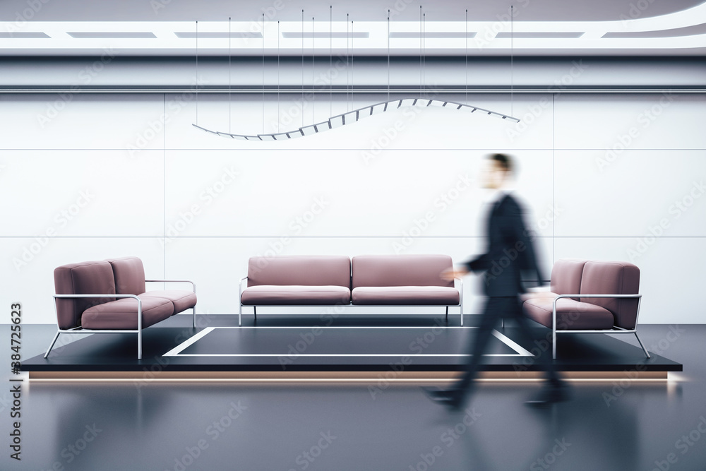 Businessman walking in waiting room