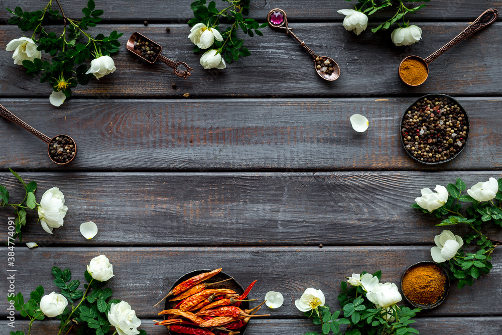 Set of hot Indian spices with flowers, top view