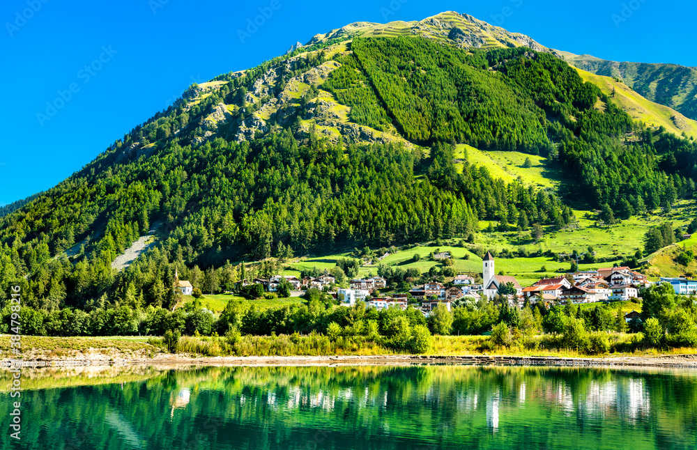 Graun im Vinschgau or Curon Venosta, a town on Lake Reschen in South Tyrol, Italian Alps