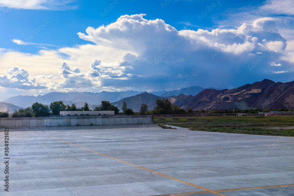 Empty square floor and mountain with sky clouds landscape.