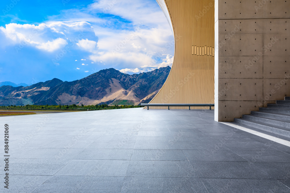 Empty square floor and mountain with sky clouds landscape.