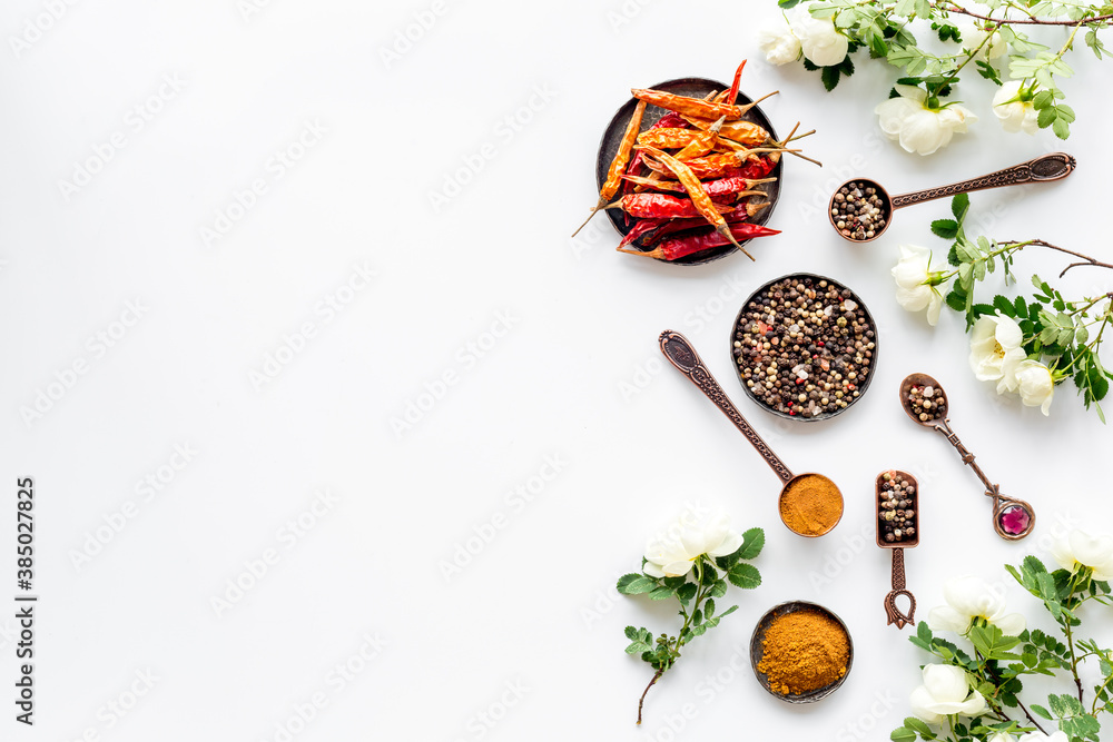 Red hot pepper and paprika - cooking utensils and spices, top view