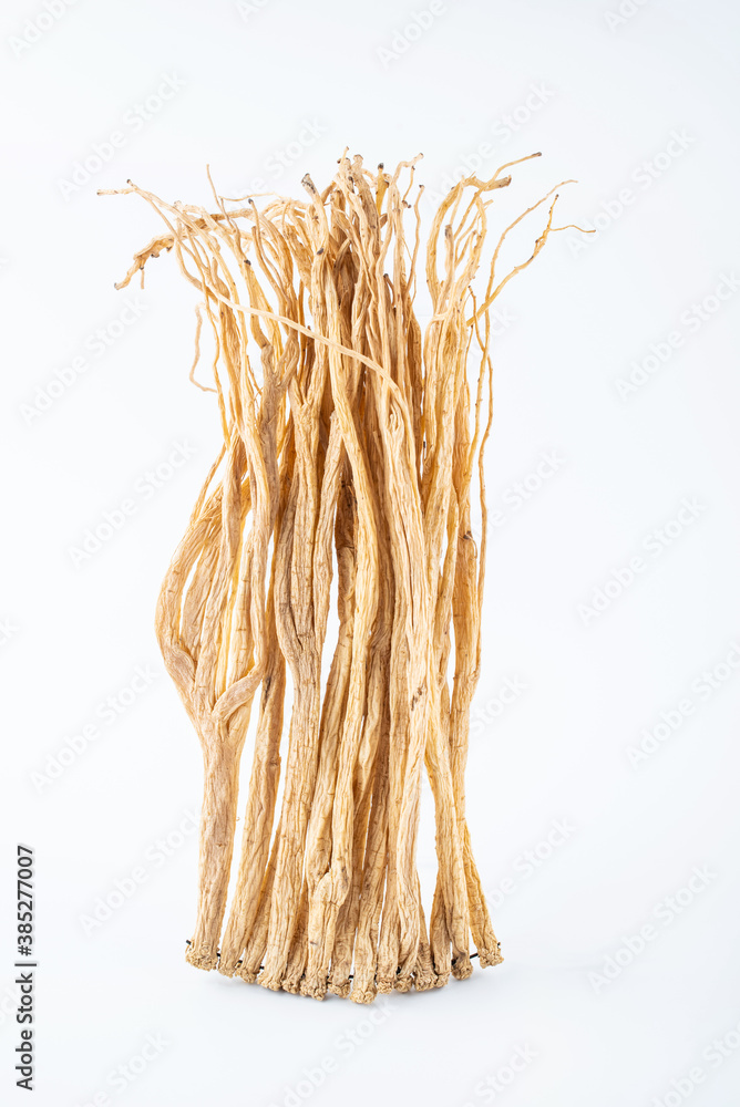 A handful of Chinese herbal medicine Codonopsis on white background