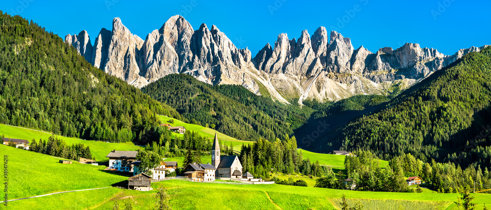 View of Val di Funes with the Chruch of Santa Maddalena in the Dolomites Mountains. UNESCO world her