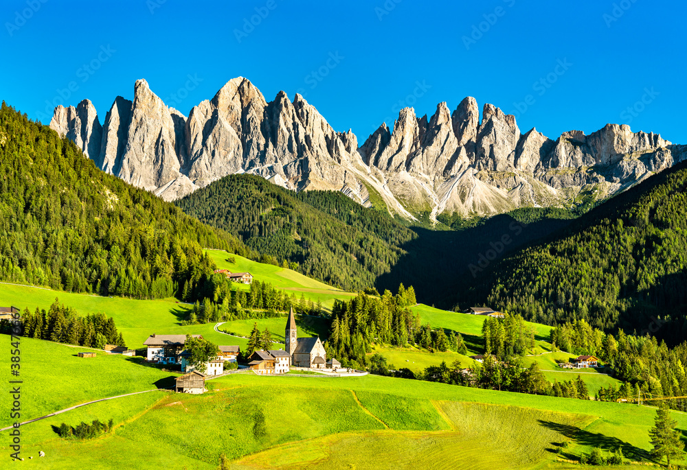 View of Val di Funes with the Chruch of Santa Maddalena in the Dolomites Mountains. UNESCO world her